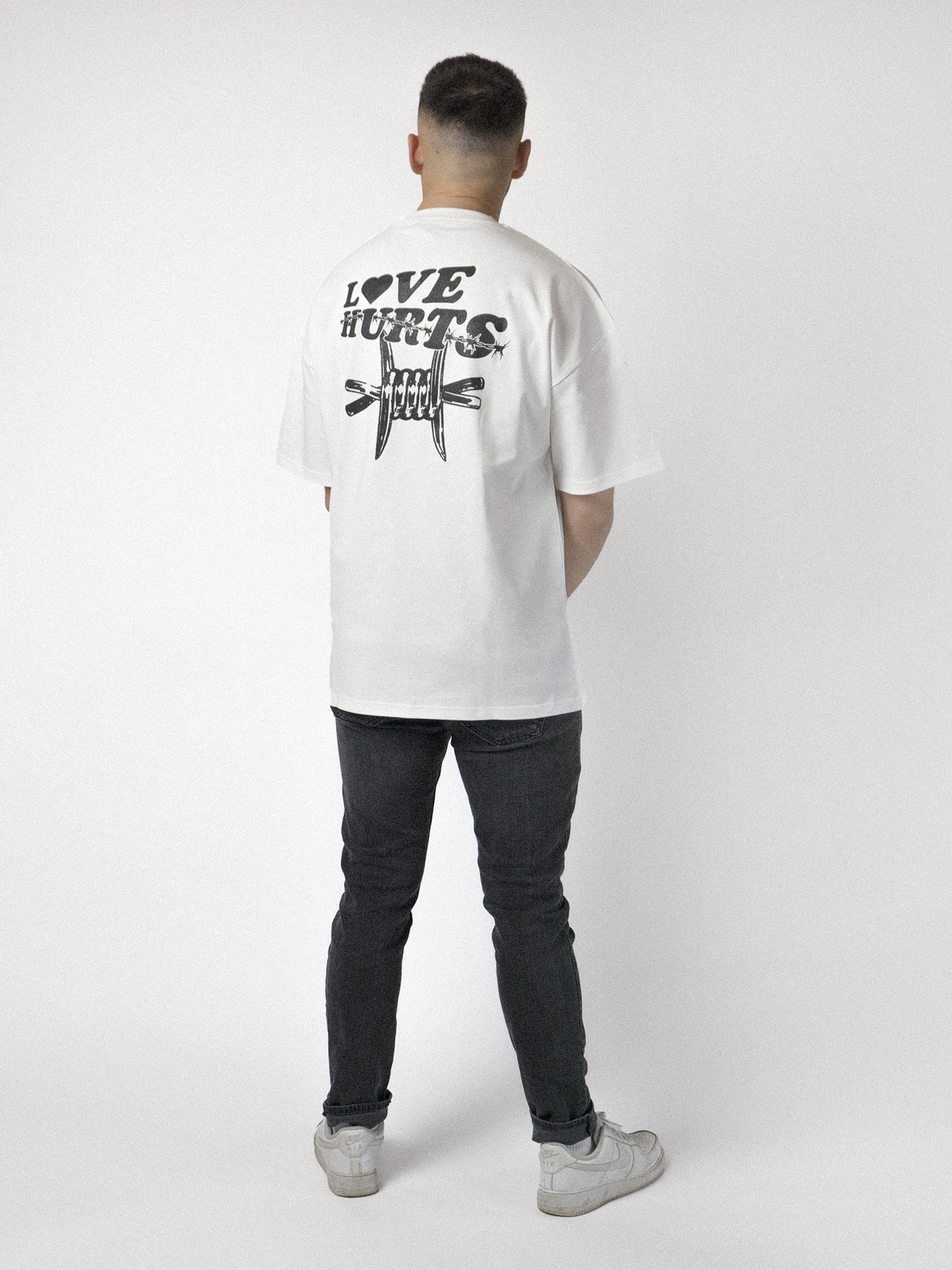 LOVE HURTS TEE